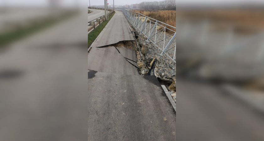 Дорожники выяснили причину обвала нового тротуара на на пешеходном мосту на Бутузова 