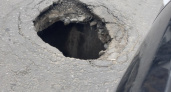 В Пензе в асфальте сразу в нескольких местах образовались черные дыры